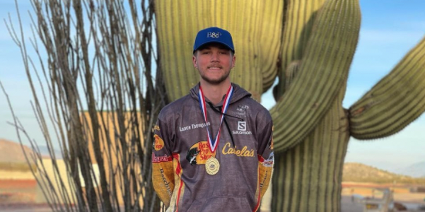 male shooting team competitor smiling 