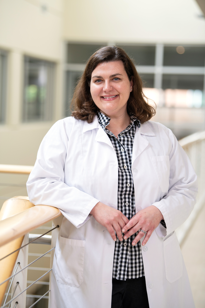 A nursing professional looking at the camera for a photo.