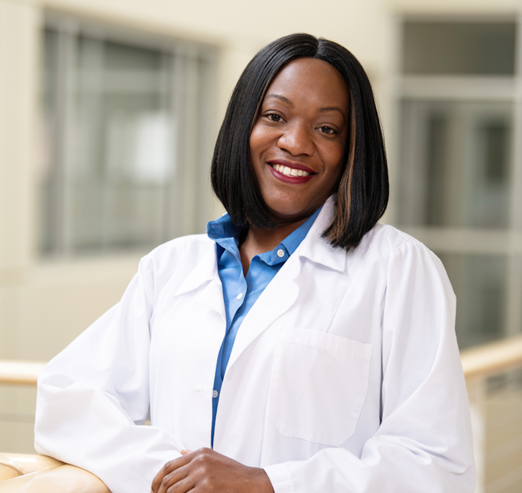 A nursing student looking at the camera for a photo.