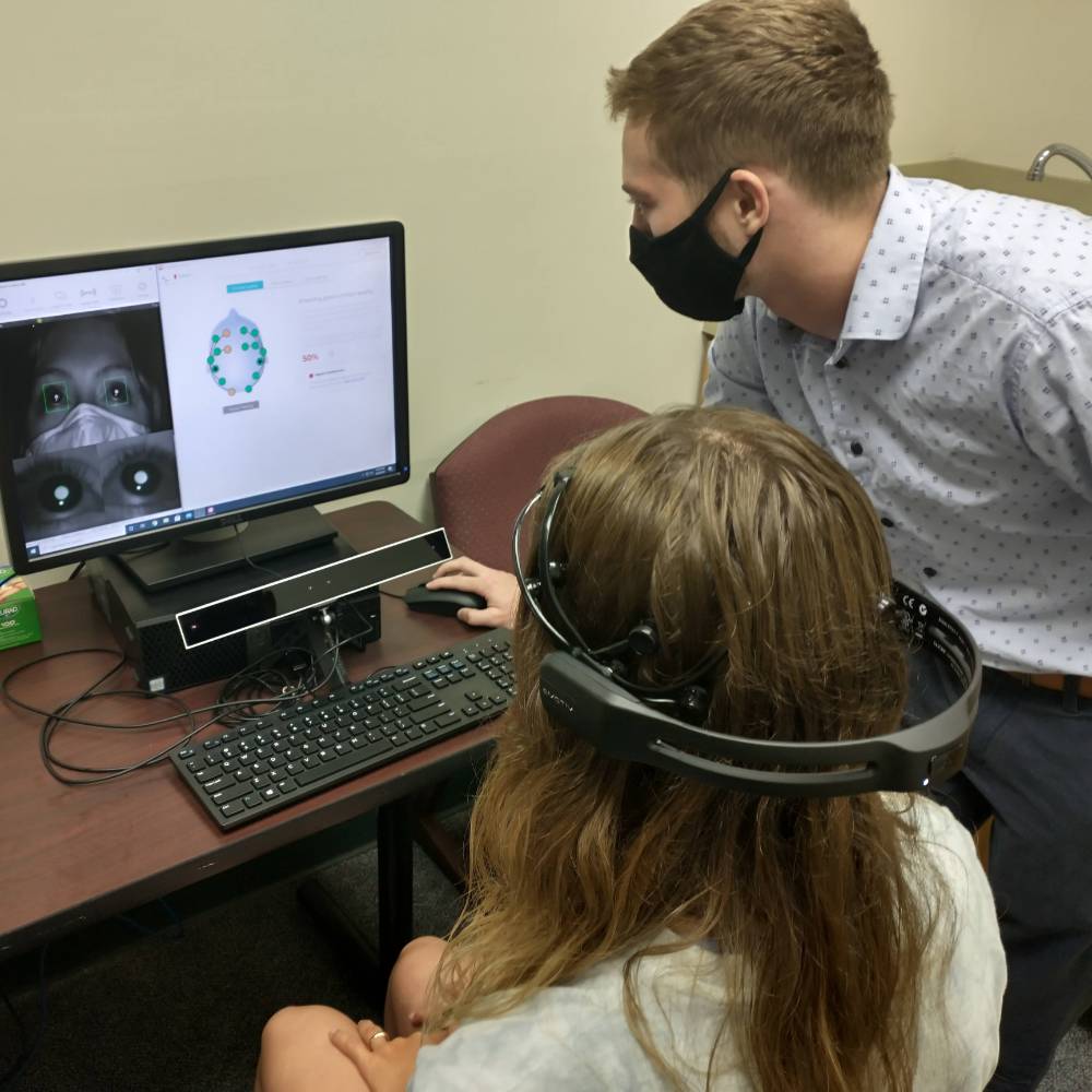 Researchers in the eye-tracking lab