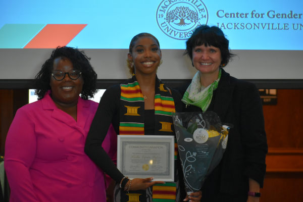Graduating students, professor and RISE Center Director at 2024 Celebration of Graduates