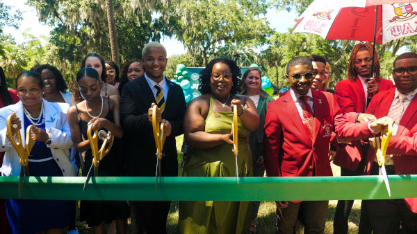Greek Plaza ribbon cutting