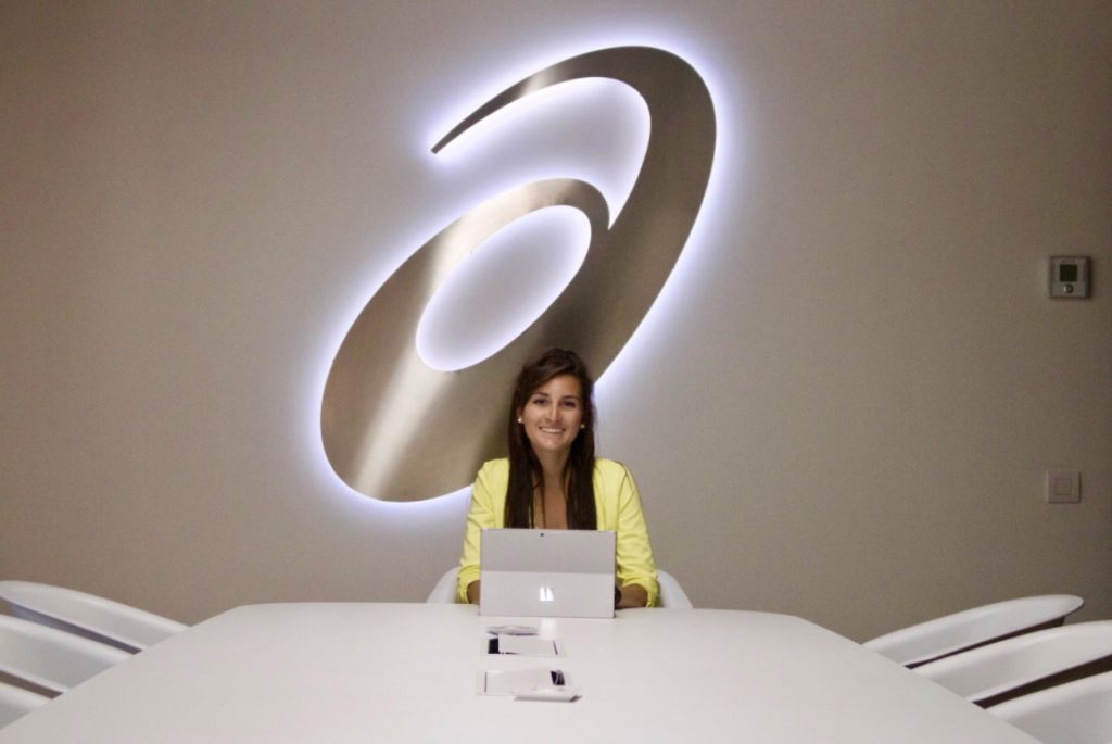 Amanda at a conference table at her internship.