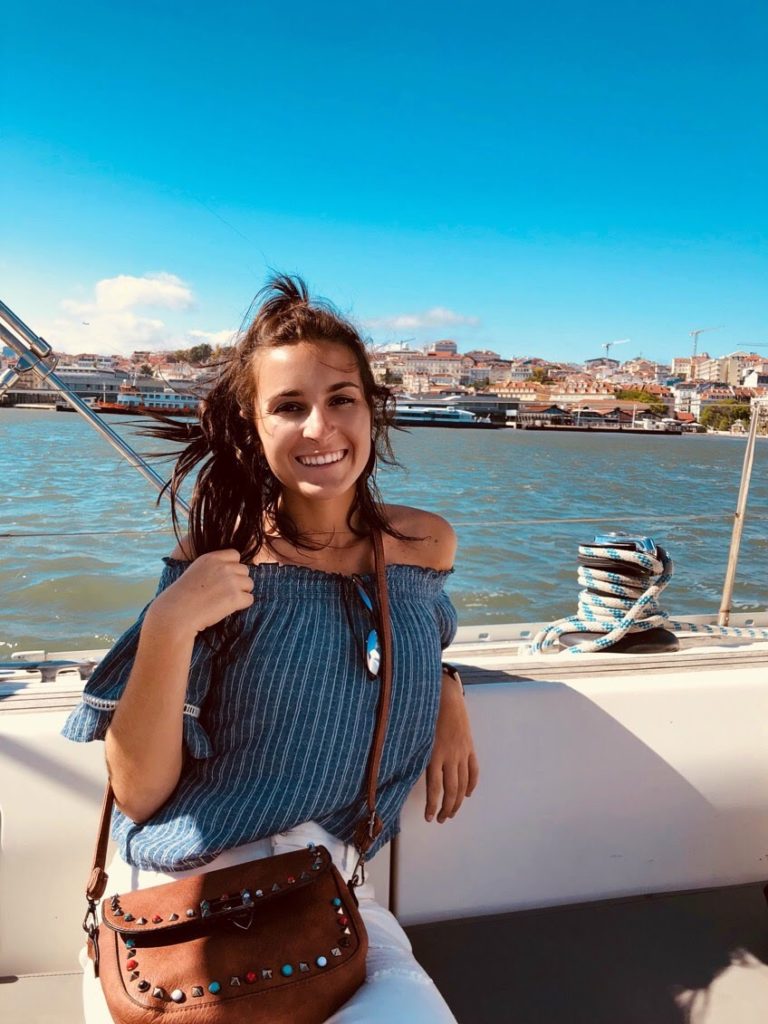 Amanda posing on a boat.