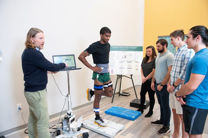 Exercise science instructor teaching students