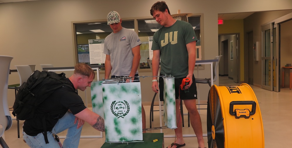 DCOB students with wind turbine